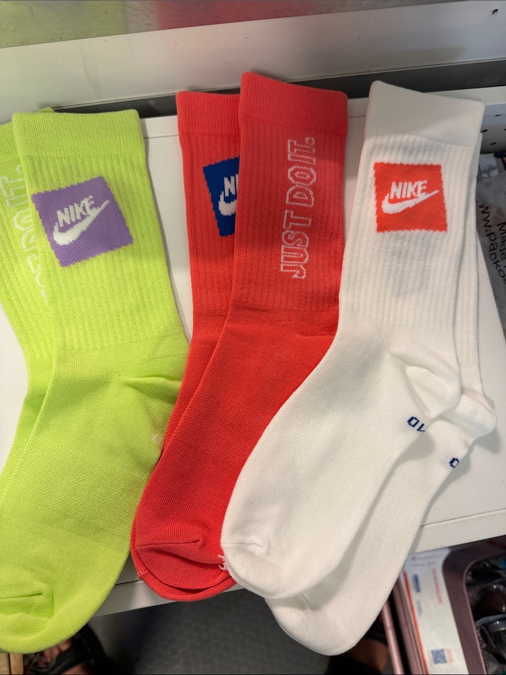 Nike Crew Socks in Neon Green, Red, White with Purple & Orange Logos